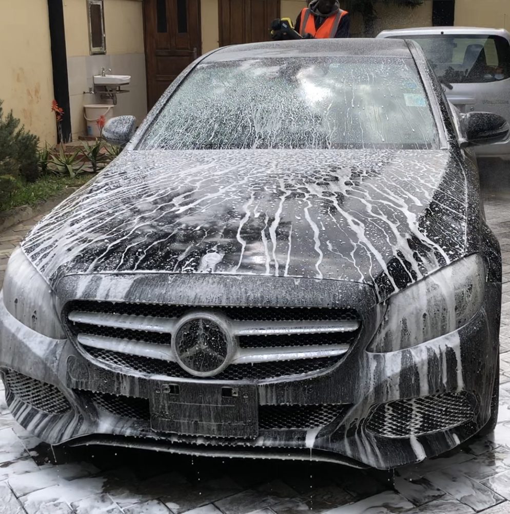 Mercedes C-Class covered in snow foam during an Express Wash