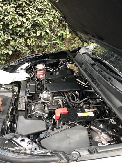 Clean, dressed engine bay of a Toyota RAV4